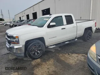 2016 Chevrolet Silverado 1500 LT with VIN 1GCVKREH1GZ424876, listed as a Copart auction lot 63009164 with 79,134 mi miles and Salvage Title. Bid and sale history available at carsss.com. Image 1.
