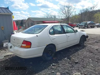 1999 Nissan Altima XE with VIN 1N4DL01D9XC204255, listed as a IAAI auction lot 42039345 with 214,039 mi miles and . Bid and sale history available at carsss.com. Image 4.