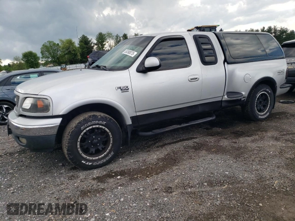 2000 Ford F-150 XL with VIN 2FTRX08L2YCA22507, listed as a Copart auction lot 55390075 with 197,785 mi miles and Salvage title. Bid and sale history available at DreamBid. Image 1.
