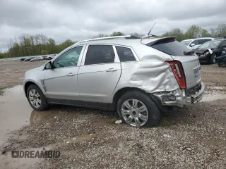 2010 Cadillac SRX Luxury Collection z VIN 3GYFNDEY1AS565329, wystawiony jako Copart lot #55753015 z przebiegiem Nie podano mil oraz Szkody całkowita. Historia ofert i sprzedaży dostępna na DreamBid. Obrazek 2.