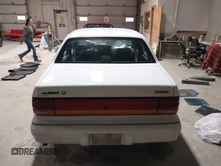 1994 Dodge Spirit z VIN 3B3AA46KXRT214299, wystawiony jako IAAI lot #41908262 z przebiegiem 72 619 mil mil oraz . Historia ofert i sprzedaży dostępna na DreamBid. Obrazek 16.