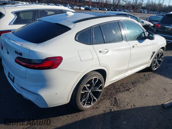 2021 BMW X4 M with VIN 5YMUJ0C02M9H67919, listed as a IAAI auction lot 41667578 with 43,567 mi miles. Bid and sale history available at carsss.com. Image 4.