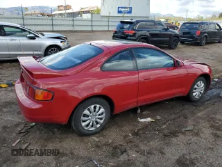1995 Toyota Celica ST z VIN JT2AT00N7S0042443, wystawiony jako Copart lot #56394475 z przebiegiem 328 515 mil mil oraz Szkody całkowita. Historia ofert i sprzedaży dostępna na DreamBid. Obrazek 3.