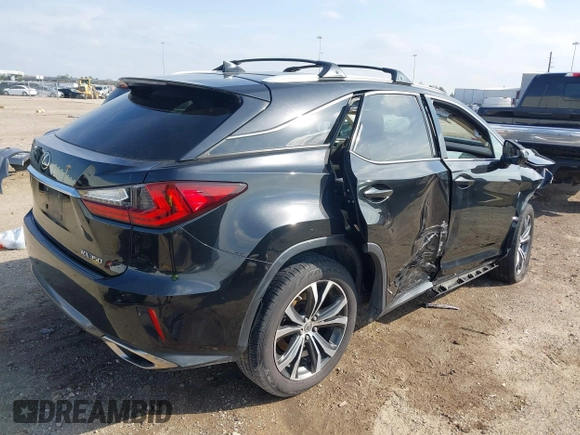 2017 Lexus RX 350 with VIN 2T2ZZMCA5HC042590, listed as a IAAI auction lot 41600994 with 126,660 mi miles and . Bid and sale history available at DreamBid. Image 4.