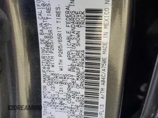 2015 Toyota Tacoma PreRunner with VIN 3TMJU4GN5FM180924, listed as a Copart auction lot 50864315 with 176,562 mi miles and Salvage title. Bid and sale history available at DreamBid. Image 14.