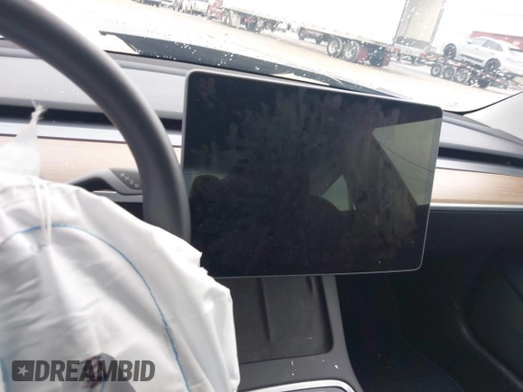 2022 Tesla Model 3 Long Range with VIN 5YJ3E1EB3NF352741, listed as a IAAI auction lot 40847981 with Not Provided miles and . Bid and sale history available at DreamBid. Image 14.