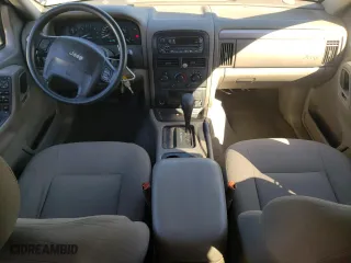 2004 Jeep Grand Cherokee Laredo with VIN 1J4GX48N14C435481, listed as a Copart auction lot 87855975 with 176,273 mi miles and Salvage Title. Bid and sale history available at carsss.com. Image 8.