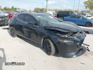 2023 Mazda 3 Premium Plus with VIN JM1BPBNY0P1615814, listed as a IAAI auction lot 41718577 with Not Provided miles and . Bid and sale history available at DreamBid. Image 1.