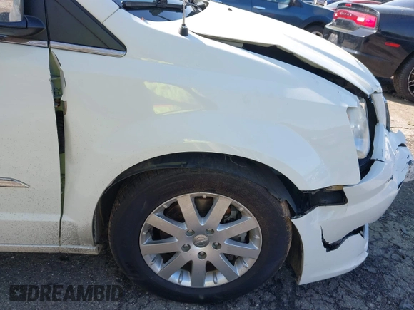 2012 Chrysler Town & Country Touring L with VIN 2C4RC1CGXCR163522, listed as a IAAI auction lot 41923296 with 218,342 mi miles and . Bid and sale history available at DreamBid. Image 12.
