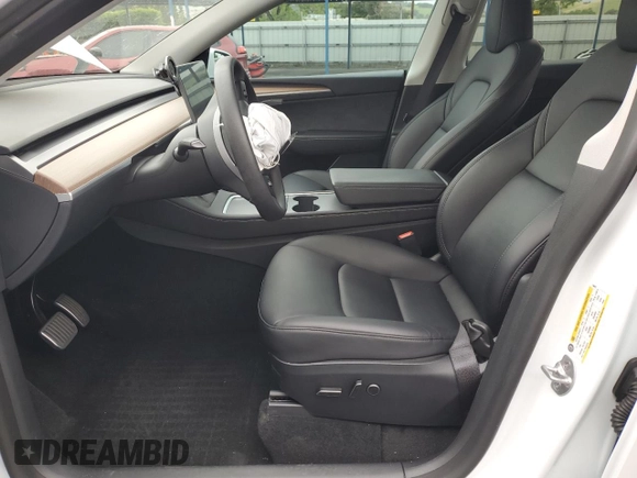2023 Tesla Model Y Long Range with VIN 7SAYGDEEXPF744472, listed as a Copart auction lot 54109315 with 15,404 mi miles and Salvage Title. Bid and sale history available at DreamBid. Image 7.