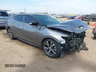 2016 Nissan Maxima SL z VIN 1N4AA6AP3GC392390, wystawiony jako IAAI lot #42260676 z przebiegiem 135 259 mil mil oraz . Historia ofert i sprzedaży dostępna na DreamBid. Obrazek 1.