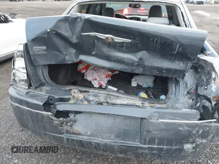 2007 Chrysler 300 Touring with VIN 2C3LK53G27H882957, listed as a IAAI auction lot 41350117 with 214,055 mi miles. Bid and sale history available at carsss.com. Image 6.