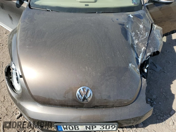2014 Volkswagen Beetle 2.0L TDI с VIN 3VW6L7ATXEM809087, выставлен на аукционе Copart как лот 53710365 с пробегом Не указан миль и Списание • Salvage title. История ставок и продаж доступна на DreamBid. Изображение 11.