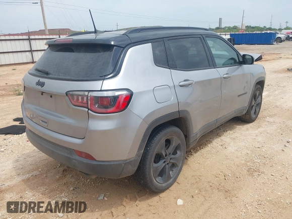 2018 Jeep Compass Latitude with VIN 3C4NJCBBXJT494116, listed as a IAAI auction lot 42150992 with 96,125 mi miles and . Bid and sale history available at DreamBid. Image 4.