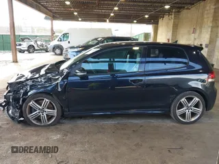 2012 Volkswagen Golf w/Sunroof & Navi z VIN WVWRF7AJ1CW285279, wystawiony jako IAAI lot #41884105 z przebiegiem 145 851 mil mil oraz . Historia ofert i sprzedaży dostępna na DreamBid. Obrazek 13.