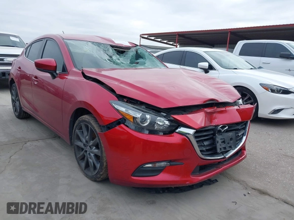 2018 Mazda 3 Touring with VIN 3MZBN1L37JM167604, listed as a IAAI auction lot 41623232 with 118,974 mi miles. Bid and sale history available at carsss.com. Image 1.