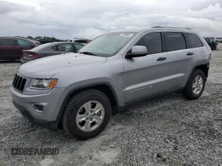2014 Jeep Grand Cherokee Laredo with VIN 1C4RJEAG2EC179547, listed as a Copart auction lot 53328055 with 107,451 mi miles and Salvage Title. Bid and sale history available at DreamBid. Image 1.