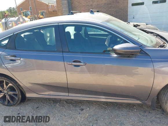 2019 Honda Civic Sport with VIN 19XFC2F88KE028035, listed as a IAAI auction lot 42000936 with 51,666 mi miles and . Bid and sale history available at DreamBid. Image 12.