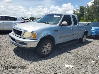 1998 Ford F-150 with VIN 2FTZX18W1WCA42311, listed as a Copart auction lot 64566775 with 231,234 mi miles and Salvage title. Bid and sale history available at DreamBid. Image 1.