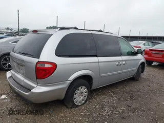 2005 Chrysler Town & Country LX with VIN 2C4GP44R35R152152, listed as a IAAI auction lot 42190551 with 128,239 mi miles and . Bid and sale history available at DreamBid. Image 4.