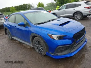 2022 Subaru WRX z VIN JF1VBAA68N9010941, wystawiony jako IAAI lot #42365334 z przebiegiem 59 581 mil mil oraz . Historia ofert i sprzedaży dostępna na DreamBid. Obrazek 1.