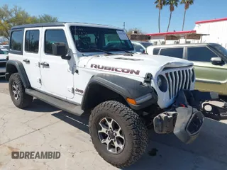 2021 Jeep Wrangler Unlimited Rubicon with VIN 1C4HJXFG1MW563073, listed as a IAAI auction lot 41852349 with 66,905 mi miles. Bid and sale history available at carsss.com. Image 1.