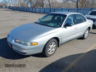 2002 Oldsmobile Intrigue GX z VIN 1G3WH52H02F104930, wystawiony jako IAAI lot #41882923 z przebiegiem 187 601 mil mil oraz . Historia ofert i sprzedaży dostępna na DreamBid. Obrazek 2.
