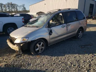 2003 Mazda MPV LX with VIN JM3LW28A930352557, listed as a Copart auction lot 77482554 with 0 mi miles and Salvage Title. Bid and sale history available at carsss.com. Image 1.