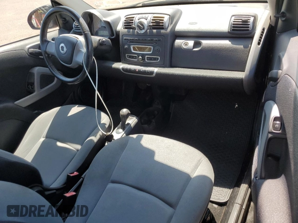 2009 Smart fortwo Pure with VIN WMEEJ31X49K322711, listed as a Copart auction lot 58749945 with 58,919 mi miles and Clean title. Bid and sale history available at DreamBid. Image 8.