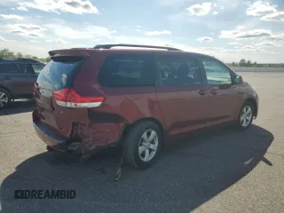 2012 Toyota Sienna LE AAS with VIN 5TDKK3DC7CS195590, listed as a Copart auction lot 57968415 with 201,732 mi miles and Salvage title. Bid and sale history available at DreamBid. Image 3.