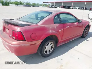 2000 Ford Mustang with VIN 1FAFP4046YF170085, listed as a IAAI auction lot 42059165 with 250,322 mi miles. Bid and sale history available at carsss.com. Image 4.