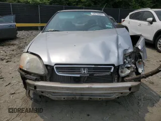 1997 Honda Civic LX z VIN 2HGEJ6677VH573069, wystawiony jako Copart lot #59739065 z przebiegiem 287 987 mil mil oraz Szkoda całkowita • Salvage title. Historia ofert i sprzedaży dostępna na DreamBid. Obrazek 5.