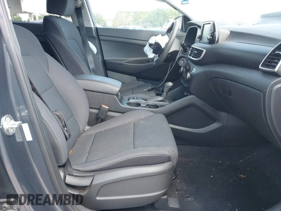 2021 Hyundai Tucson SE with VIN KM8J23A48MU379826, listed as a IAAI auction lot 41887834 with 51,885 mi miles and . Bid and sale history available at DreamBid. Image 5.