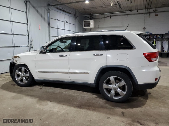 2012 Jeep Grand Cherokee Overland with VIN 1C4RJFCT5CC185100, listed as a Copart auction lot 42745615 with 126,696 mi miles and Salvage Title. Bid and sale history available at carsss.com. Image 2.