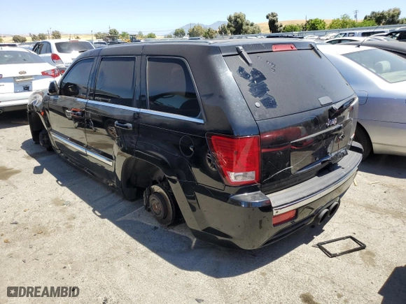 2007 Jeep Grand Cherokee SRT-8 with VIN 1J8HR78387C603473, listed as a Copart auction lot 57712964 with 114,429 mi miles and Salvage Title. Bid and sale history available at carsss.com. Image 2.