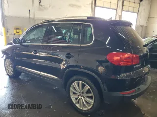 2013 Volkswagen Tiguan SE z VIN WVGBV7AX9DW529234, wystawiony jako Copart lot #41610635 z przebiegiem 130 566 mil mil oraz Szkoda całkowita • Salvage title. Historia ofert i sprzedaży dostępna na DreamBid. Obrazek 2.