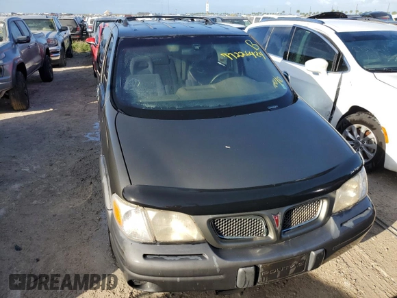 1998 Pontiac Montana z VIN 1GMDX03EXWD344453, wystawiony jako Copart lot #77226424 z przebiegiem Nie podano mil oraz Szkoda całkowita • Salvage title. Historia ofert i sprzedaży dostępna na DreamBid. Obrazek 5.