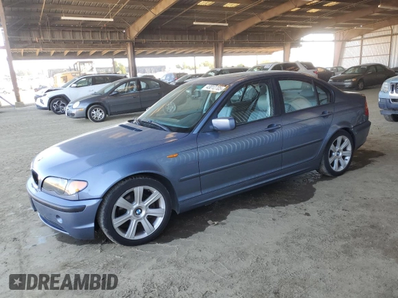 2002 BMW 3 Series 325i with VIN WBAEV33462KL78187, listed as a Copart auction lot 43012705 with 165,262 mi miles and Clean Title. Bid and sale history available at carsss.com. Image 1.