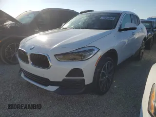 2021 BMW X2 sDrive28i with VIN WBXYH9C04M5S52793, listed as a Copart auction lot 75648044 with 37,990 mi miles and Salvage Title. Bid and sale history available at carsss.com. Image 1.