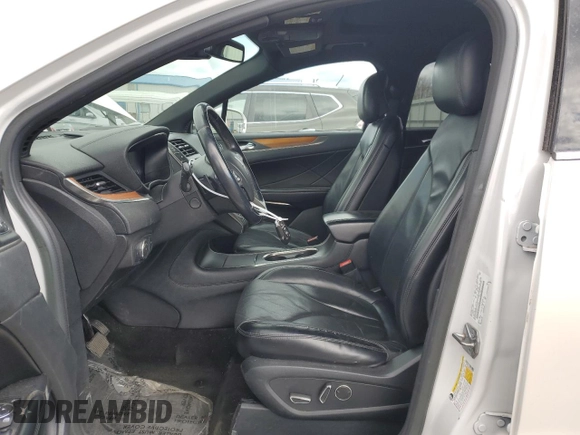 2015 Lincoln MKC z VIN 5LMTJ2AHXFUJ41226, wystawiony jako Copart lot #53430915 z przebiegiem 79 737 mil mil oraz Szkoda całkowita • Salvage title. Historia ofert i sprzedaży dostępna na DreamBid. Obrazek 7.