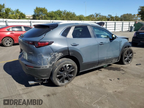2023 Mazda CX-30 2.5 S Carbon Edition with VIN 3MVDMBCM5PM508471, listed as a Copart auction lot 87279944 with 29,756 mi miles and Non Repairable. Bid and sale history available at carsss.com. Image 3.