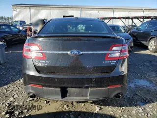 2014 Ford Taurus Limited z VIN 1FAHP2J8XEG170806, wystawiony jako Copart lot #84871394 z przebiegiem 170 124 mil mil oraz Czysty tytuł • Clean title. Historia ofert i sprzedaży dostępna na DreamBid. Obrazek 6.