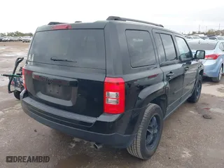 2014 Jeep Patriot Sport with VIN 1C4NJPBA5ED769871, listed as a IAAI auction lot 41146384 with 63,356 mi miles. Bid and sale history available at carsss.com. Image 4.