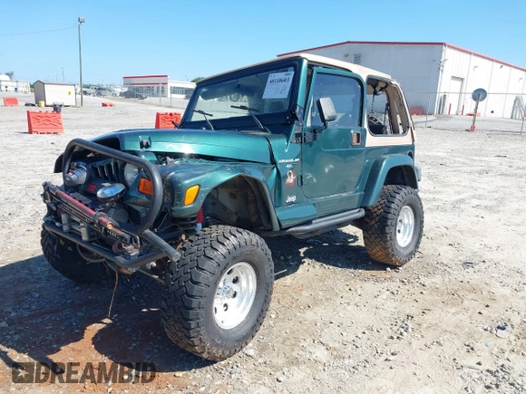 2001 Jeep Wrangler Sahara with VIN 1J4FA59S71P340368, listed as a IAAI auction lot 40148603 with 138,710 mi miles. Bid and sale history available at carsss.com. Image 2.