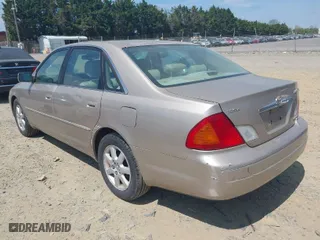 2002 Toyota Avalon XL with VIN 4T1BF28BX2U266853, listed as a IAAI auction lot 42091935 with 176,192 mi miles. Bid and sale history available at carsss.com. Image 3.