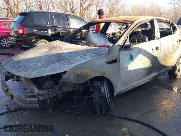 2015 Kia Optima LX with VIN KNAGM4A76F5555968, listed as a IAAI auction lot 41409612 with Not provided miles and . Bid and sale history available at DreamBid. Image 6.