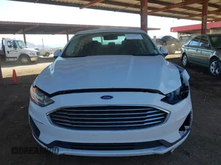2019 Ford Fusion SE with VIN 3FA6P0H76KR219092, listed as a IAAI auction lot 41666866 with 86,590 mi miles. Bid and sale history available at carsss.com. Image 6.