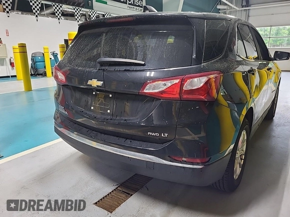 2021 Chevrolet Equinox LT with VIN 2GNAXTEV8M6112698, listed as a IAAI auction lot 42547280 with 66,209 mi miles and . Bid and sale history available at DreamBid. Image 42.