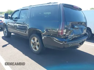 2014 Chevrolet Suburban LT z VIN 1GNSCJE02ER116017, wystawiony jako IAAI lot #42308074 z przebiegiem 228 365 mil mil oraz . Historia ofert i sprzedaży dostępna na DreamBid. Obrazek 3.