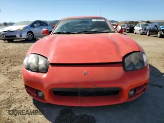 1999 Mitsubishi 3000GT z VIN JA3AM44H2XY001614, wystawiony jako Copart lot #77580444 z przebiegiem 128 948 mil mil oraz Tytuł czysty. Historia ofert i sprzedaży dostępna na DreamBid. Obrazek 5.